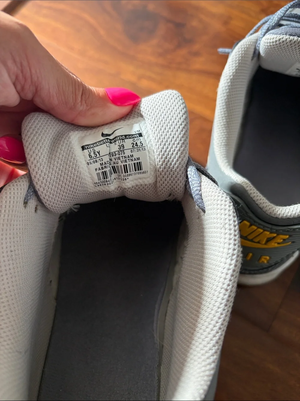 Nike Gray Sneakers with Pink Logo and Yellow Outsole